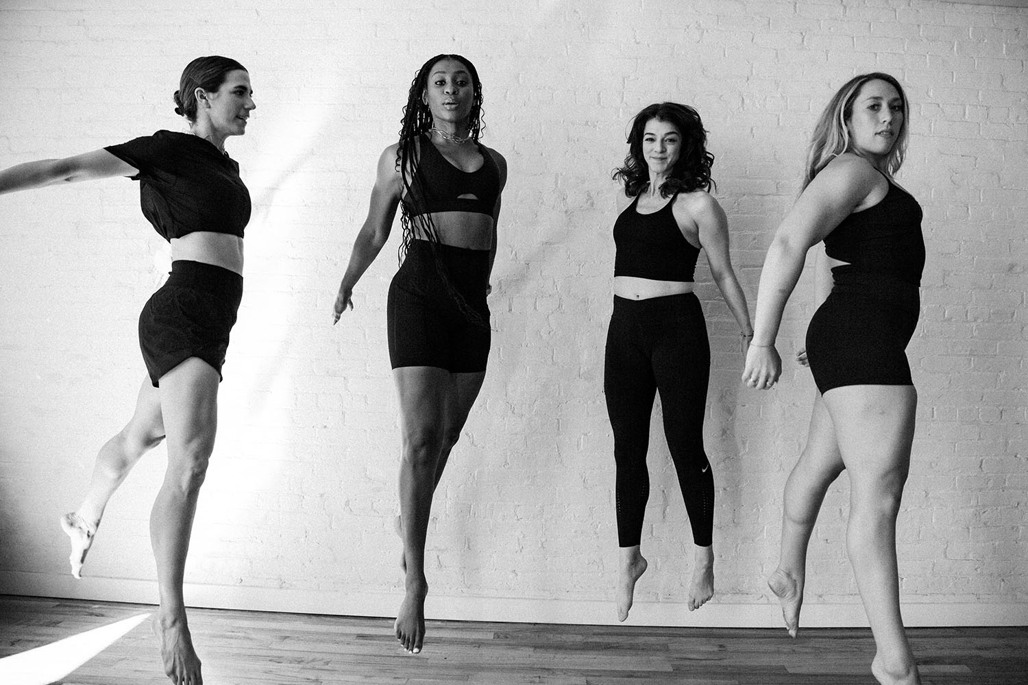 a group of women jumping