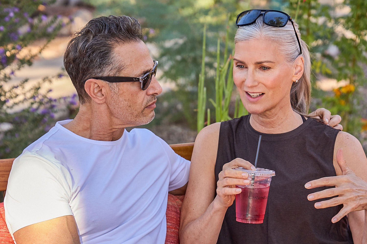 a couple cuddling and talking