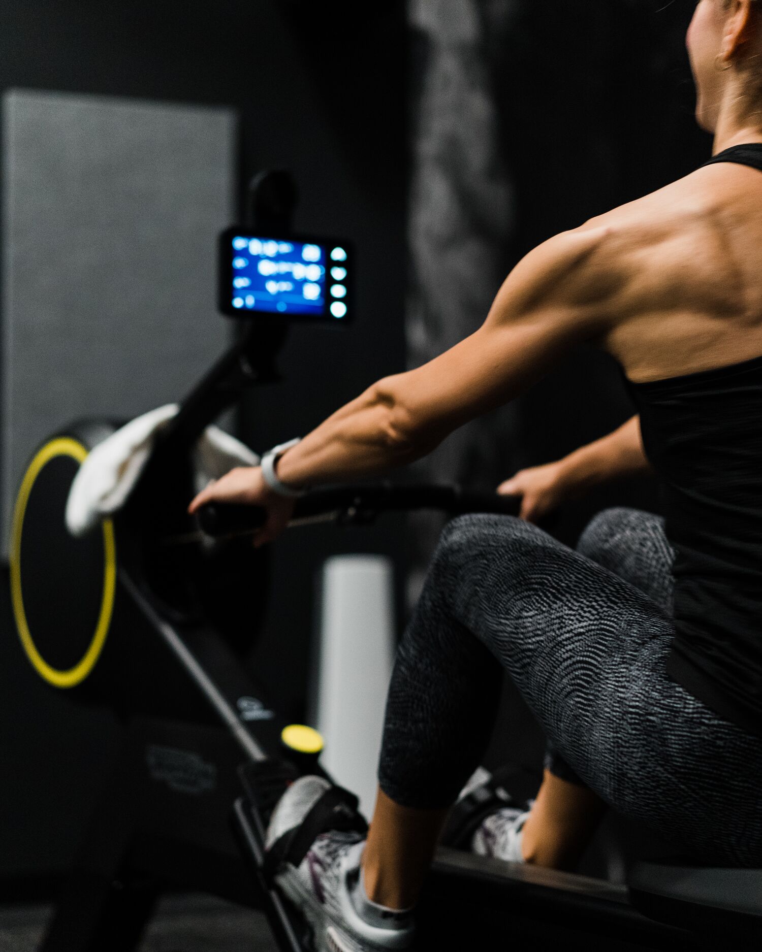 A woman on a rowing machine