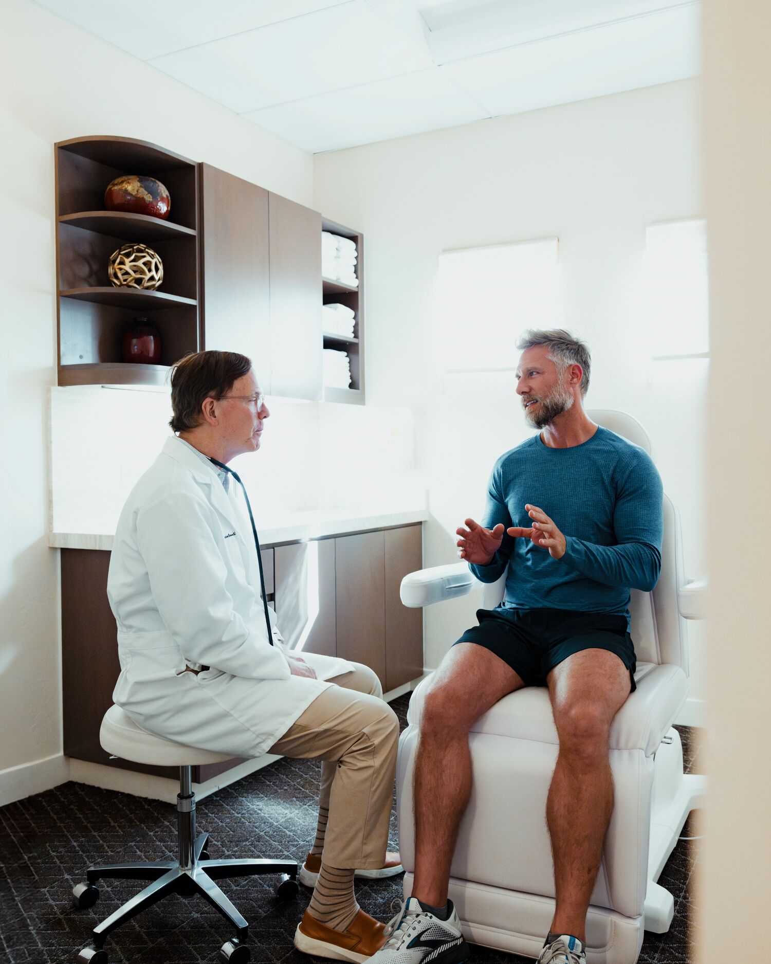 A man meeting with a doctor