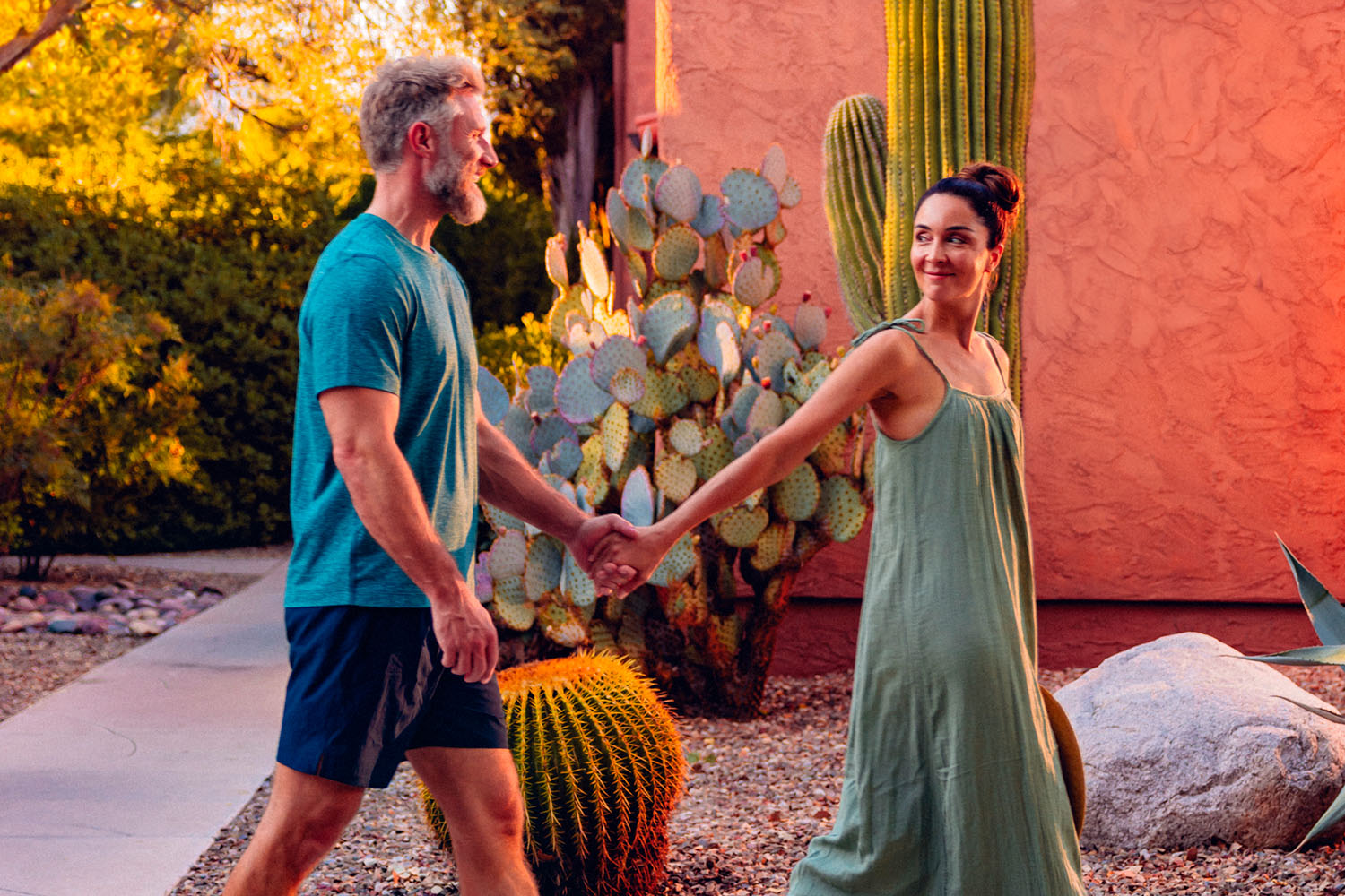 Man and Woman Walking Together Holding Hands 
