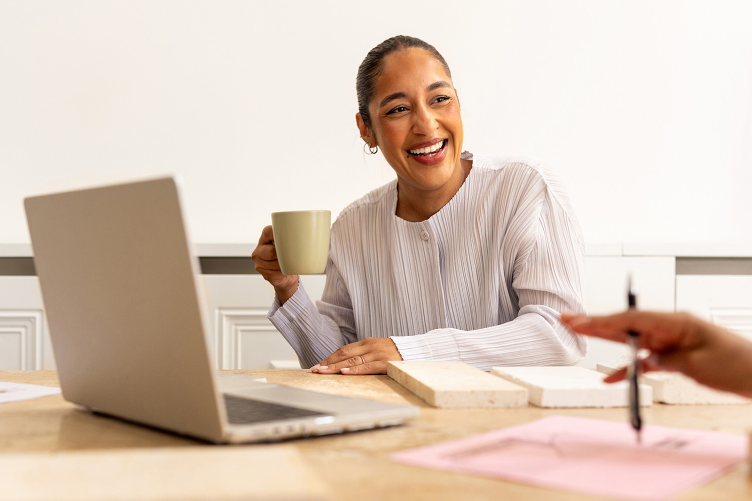 a woman drinking coffee