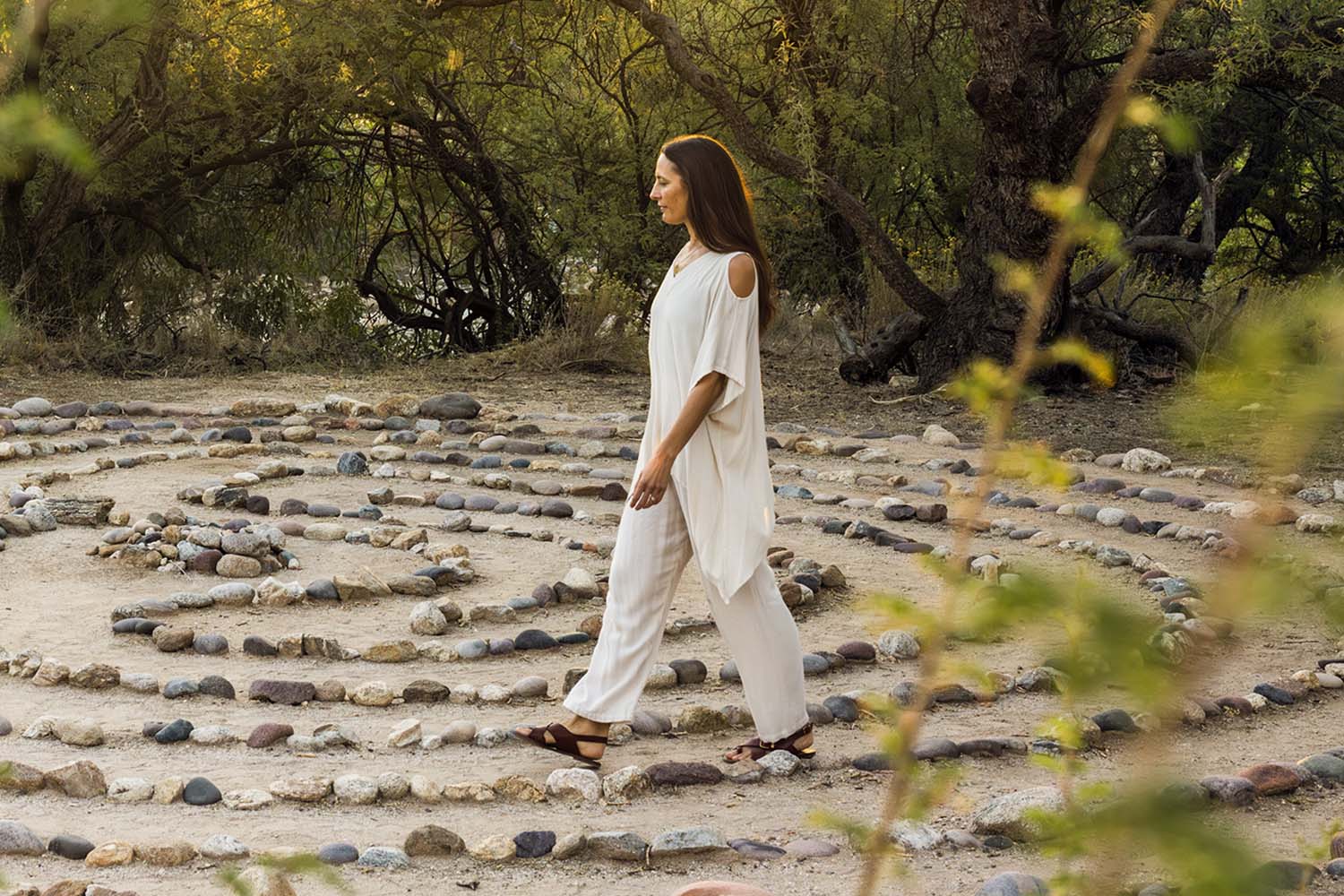 a woman walking the labyrinth path at Canyon Ranch Tucson