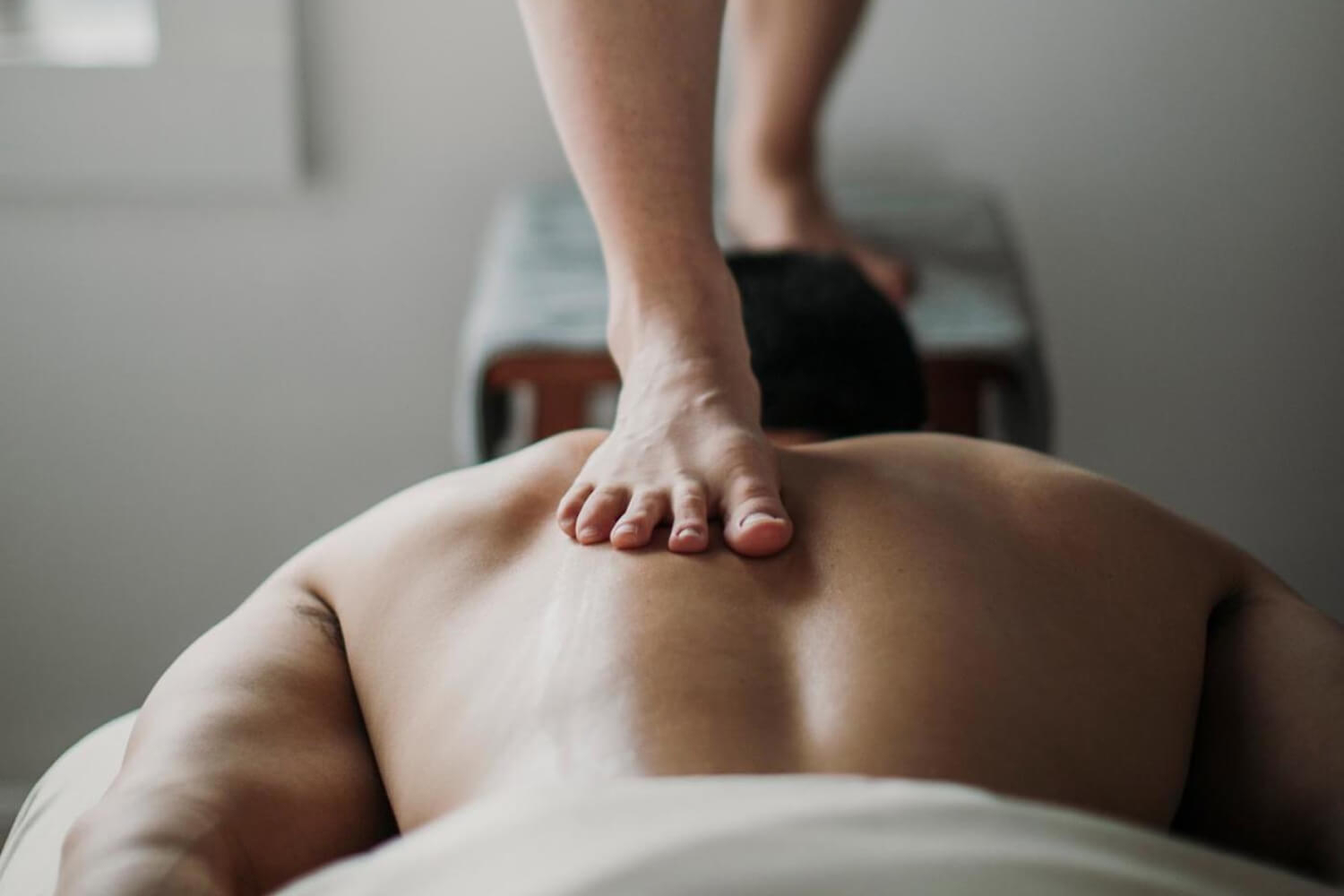 Kyle Lam Receiving an Ashiatsu Massage
