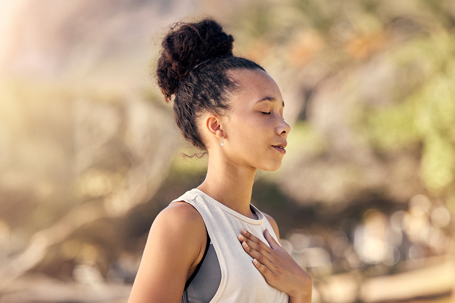 a woman meditating through breathwork at Canyon Ranch Tucson