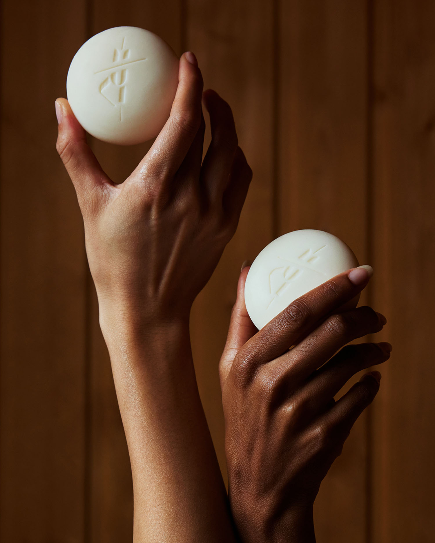 two hands holding up Kate McLeod Lotion Bars & Solid Moisturizers 