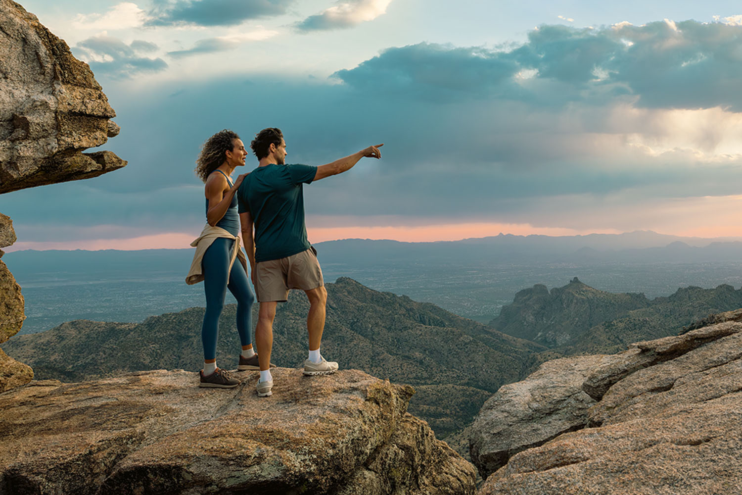 a couple hiking in the Sonoran Desert