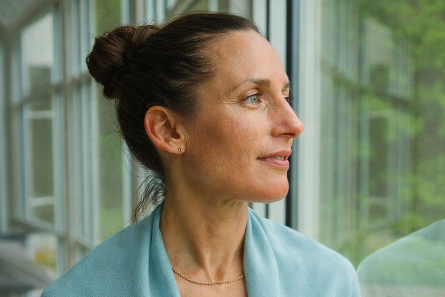 A woman looking out the window