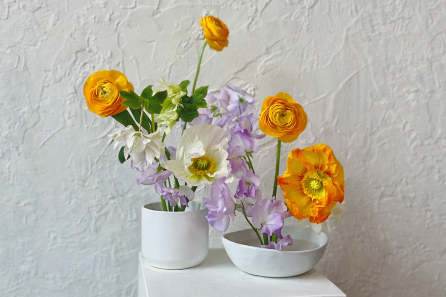 Two vases with flowers