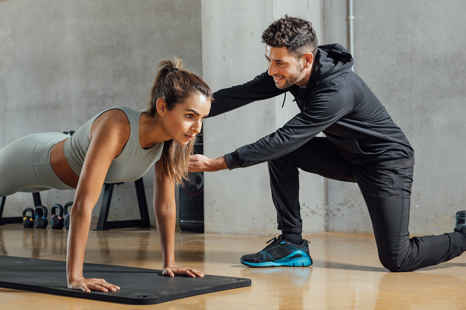 a woman getting a personal training sessions
