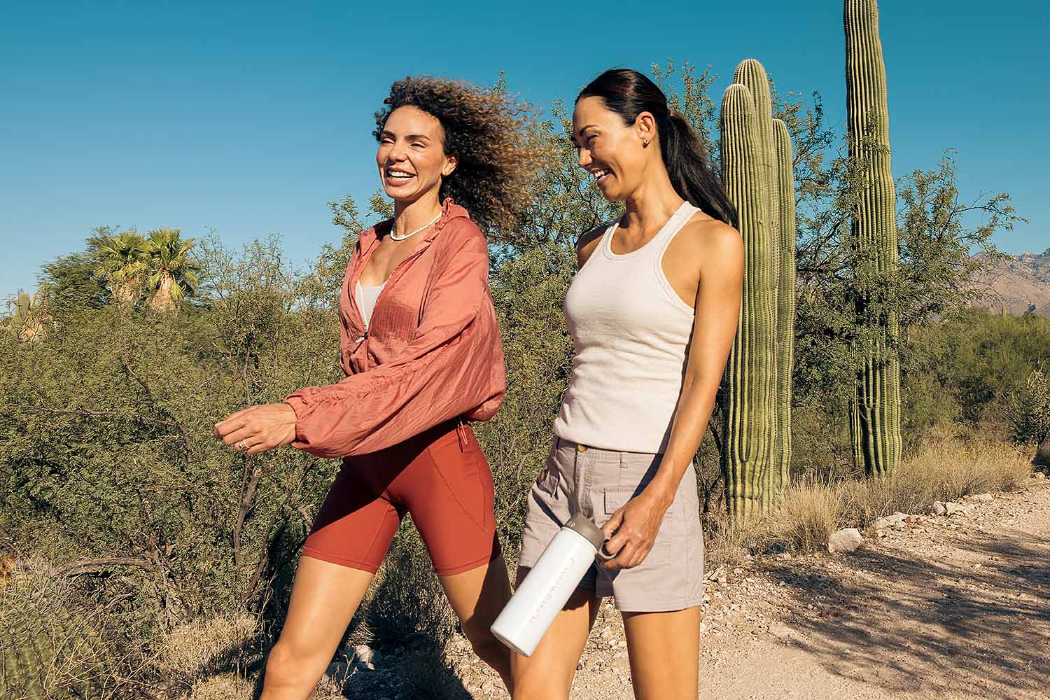 Two women hiking in the desert