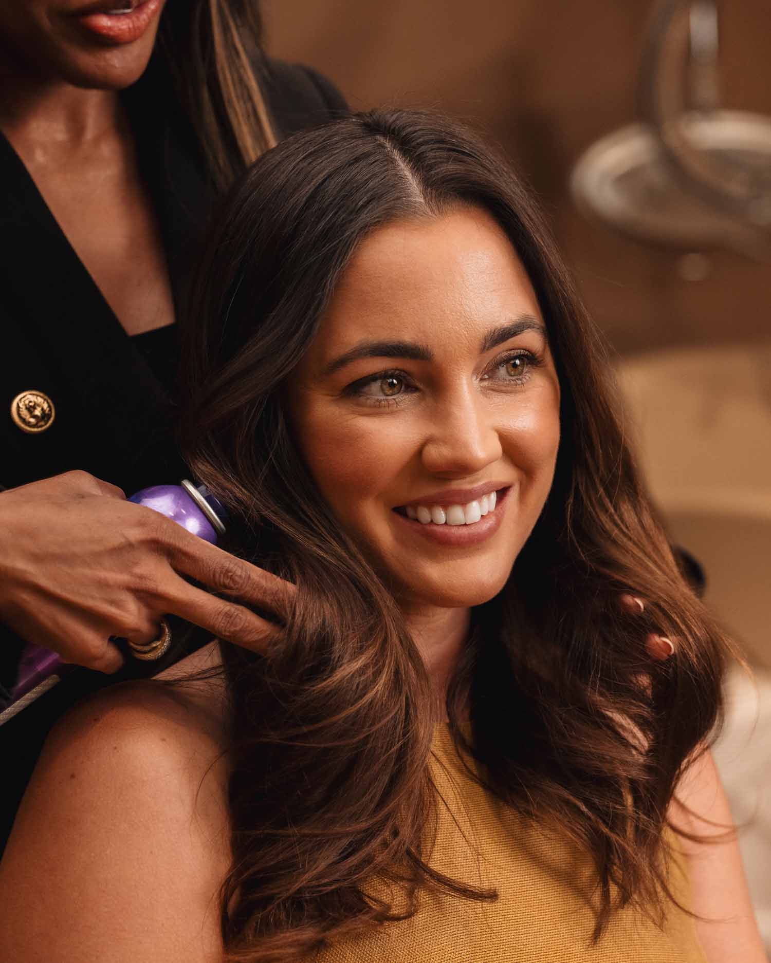 Woman Receiving a Blowout