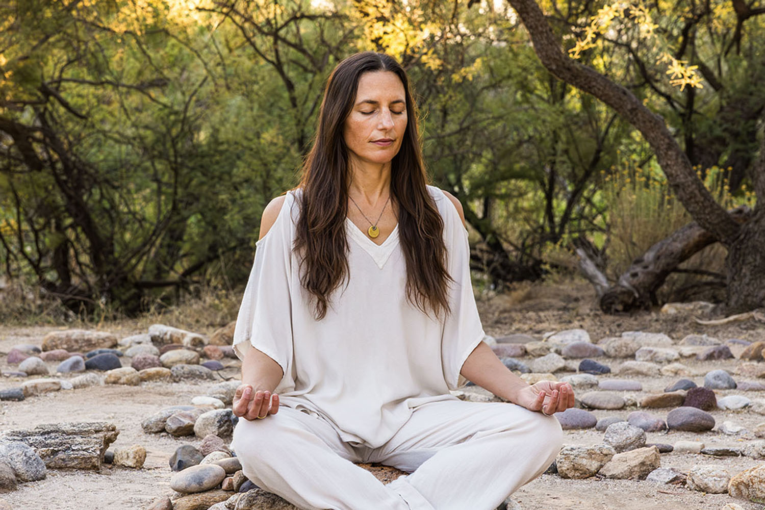 a woman meditating at Canyon Ranch Tucson