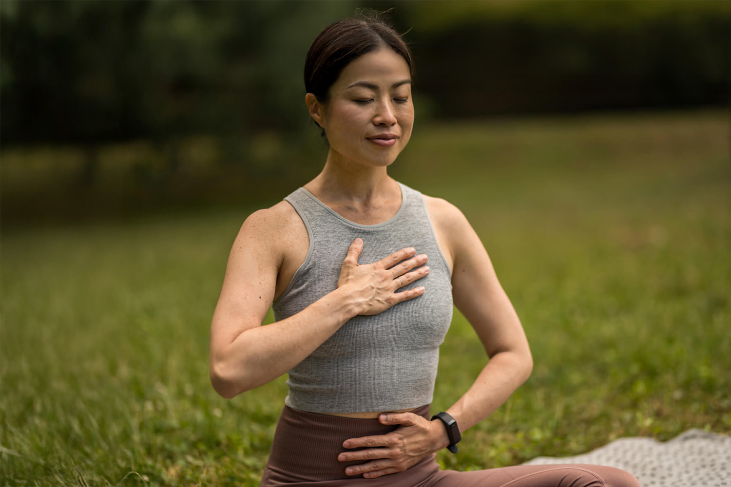 a woman meditating through breathwork at Canyon Ranch Tucson