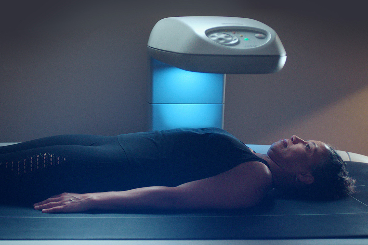 a woman getting a dexa scan