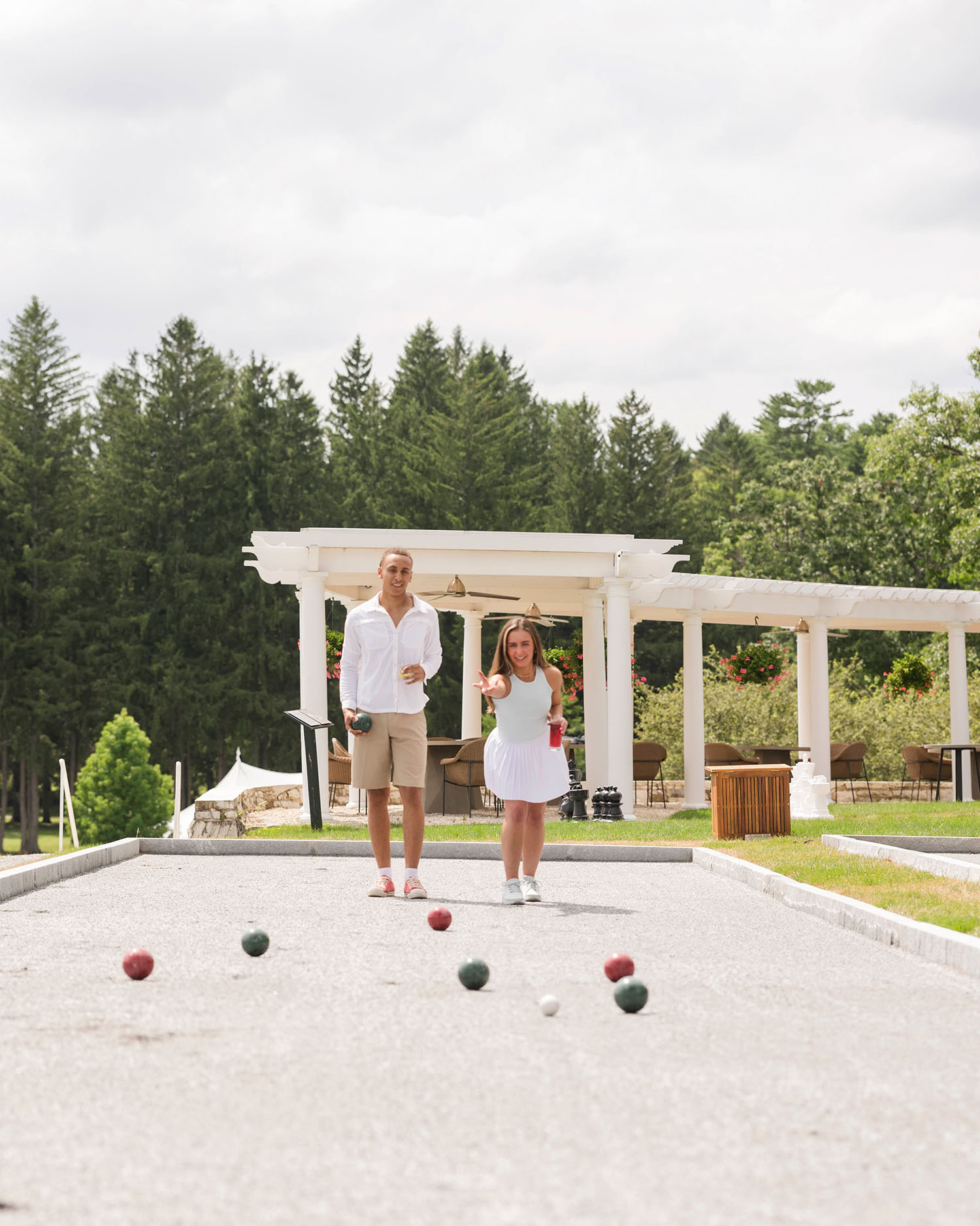 Man and Woman Playing Bocce
