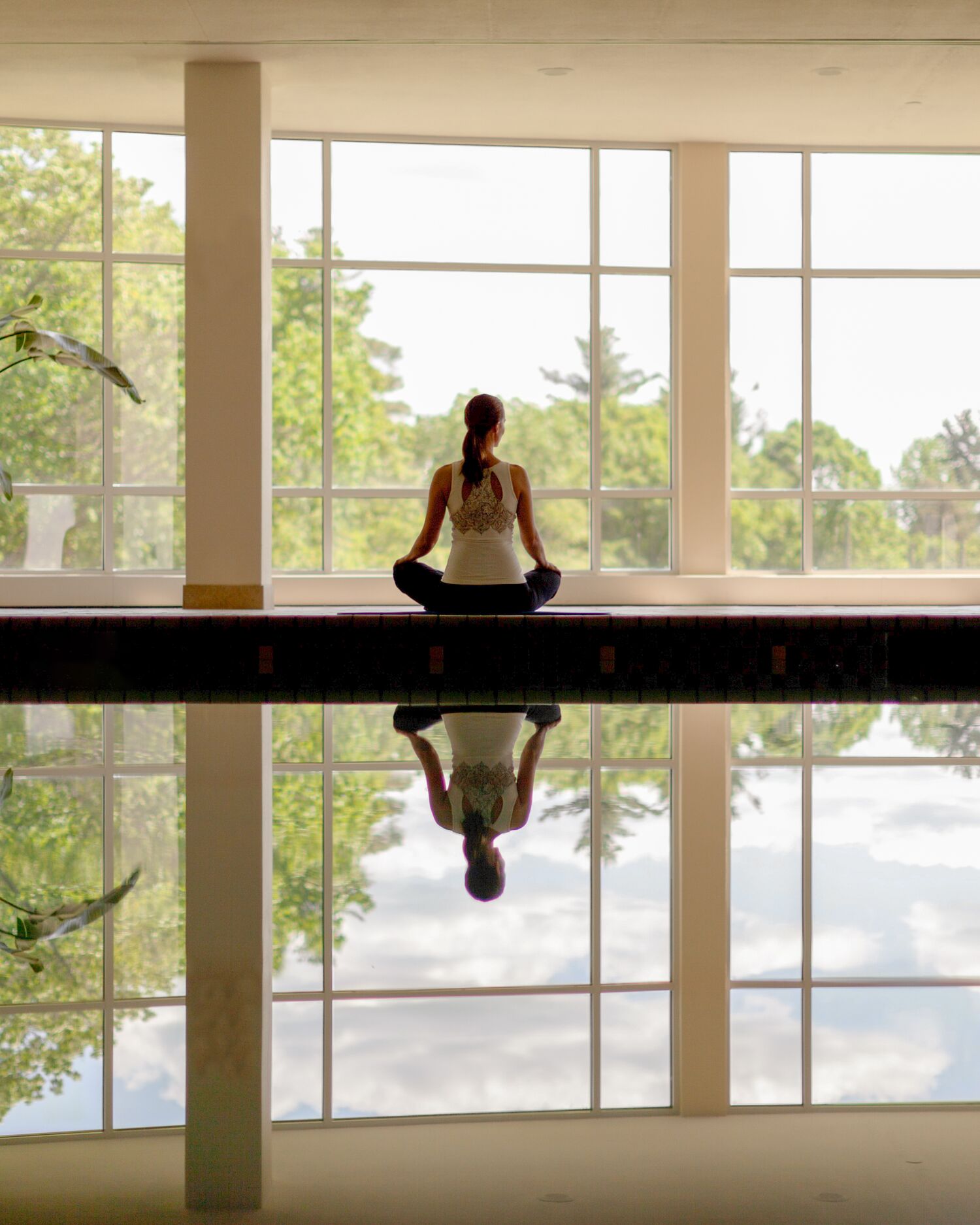 Woman Meditating at the Indoor Pool at Canyon Ranch Lenox