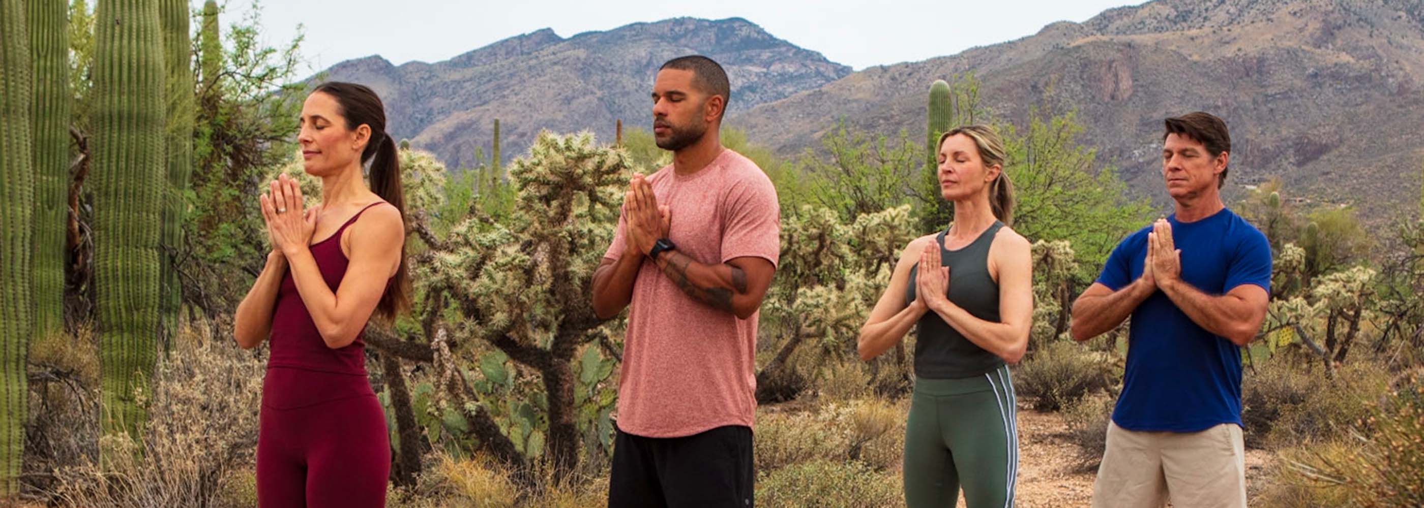 Group Doing Outdoor Yoga at Canyon Ranch Tucson