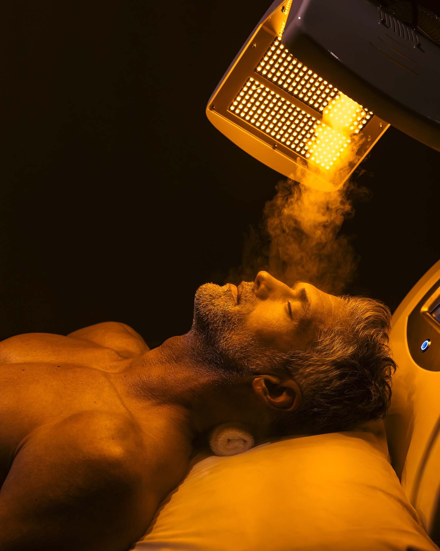 A Man Getting an IonixLight Anti-Aging Facial