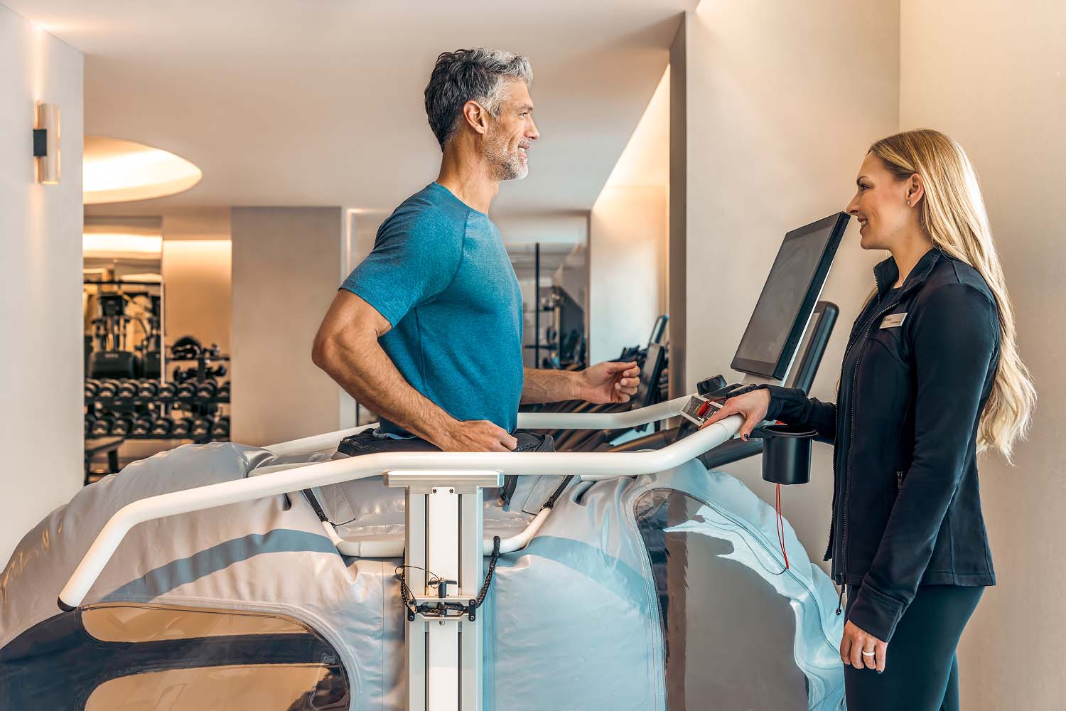 Man on a Treadmill with Performance Scientist