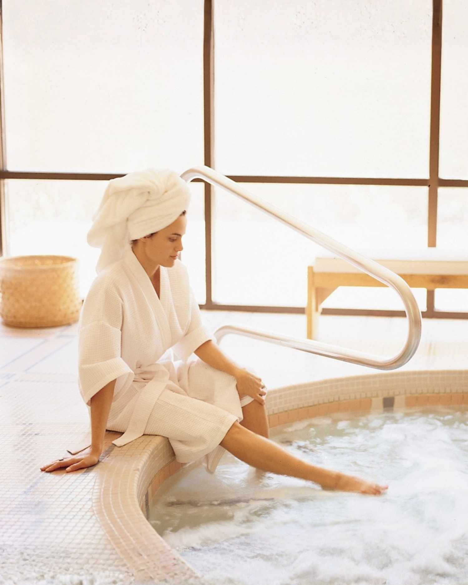 A woman sitting by the whirlpool at Canyon Ranch