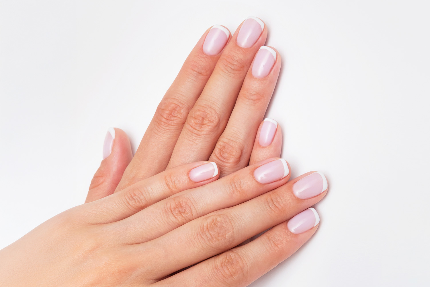 Woman's Hands With Soft Gel Extensions  
