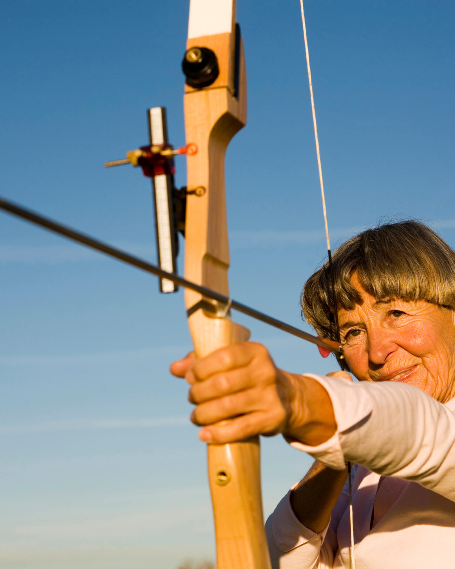 Woman Doing an Archery Workshop