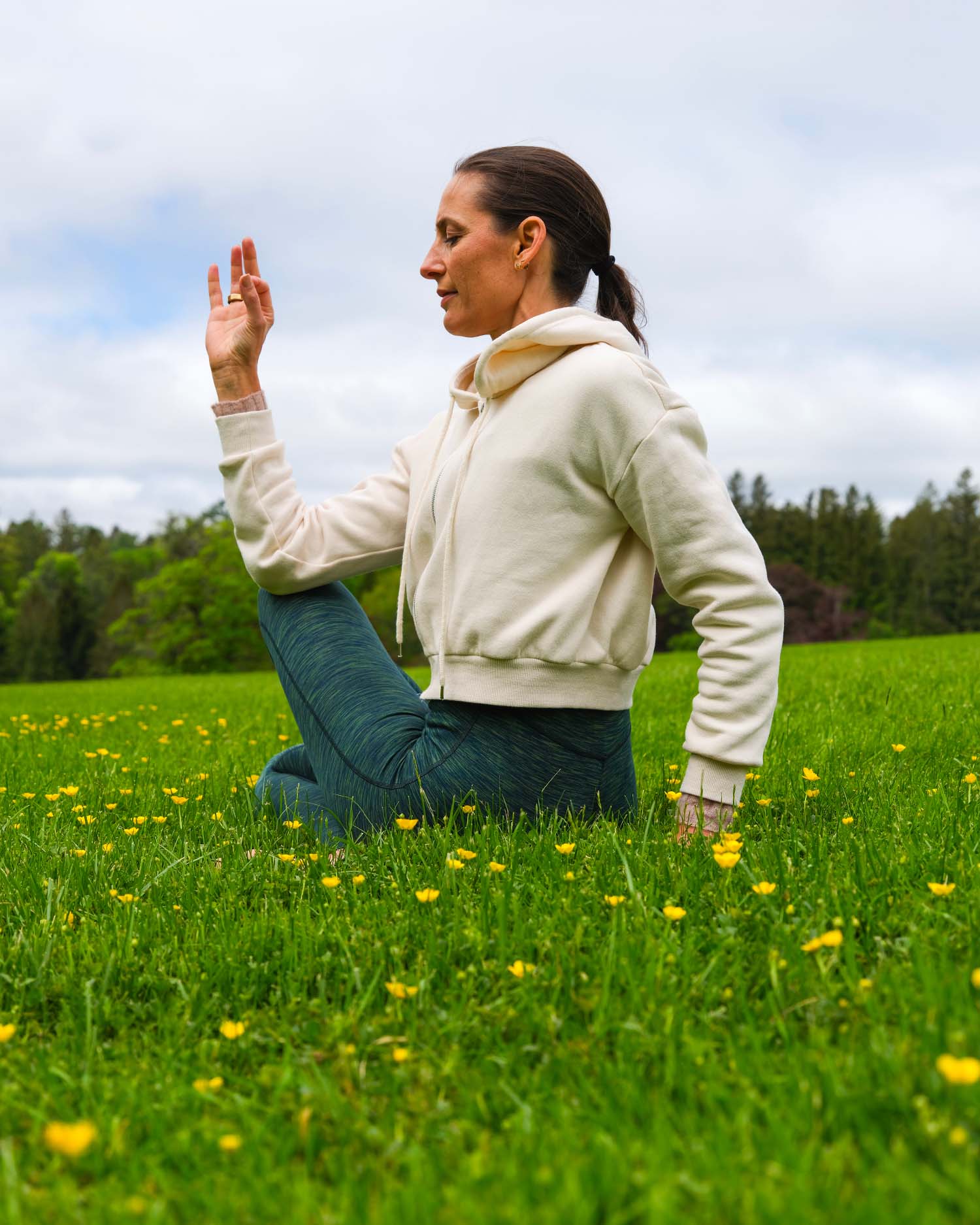 Woman Practicing Yoga Outdoors During the Berkshires Spring