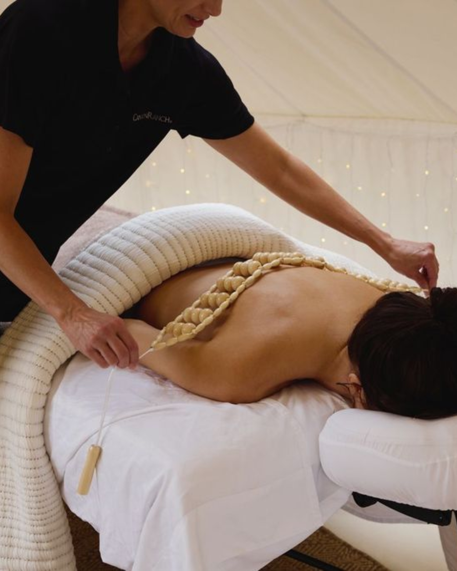 A woman getting a massage outdoors