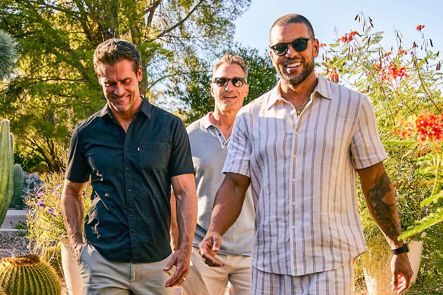 a group of men walking through the Canyon Ranch Tucson Property