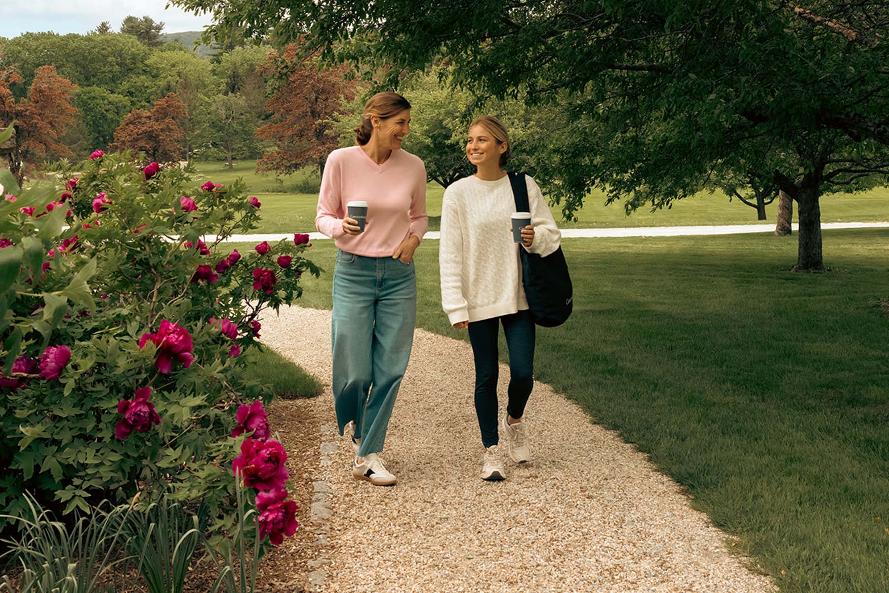 a mother and daughter walking together