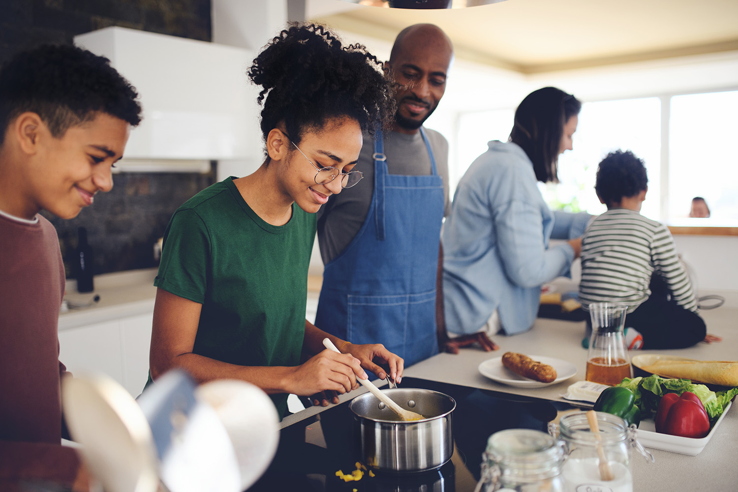 a family cooking together
