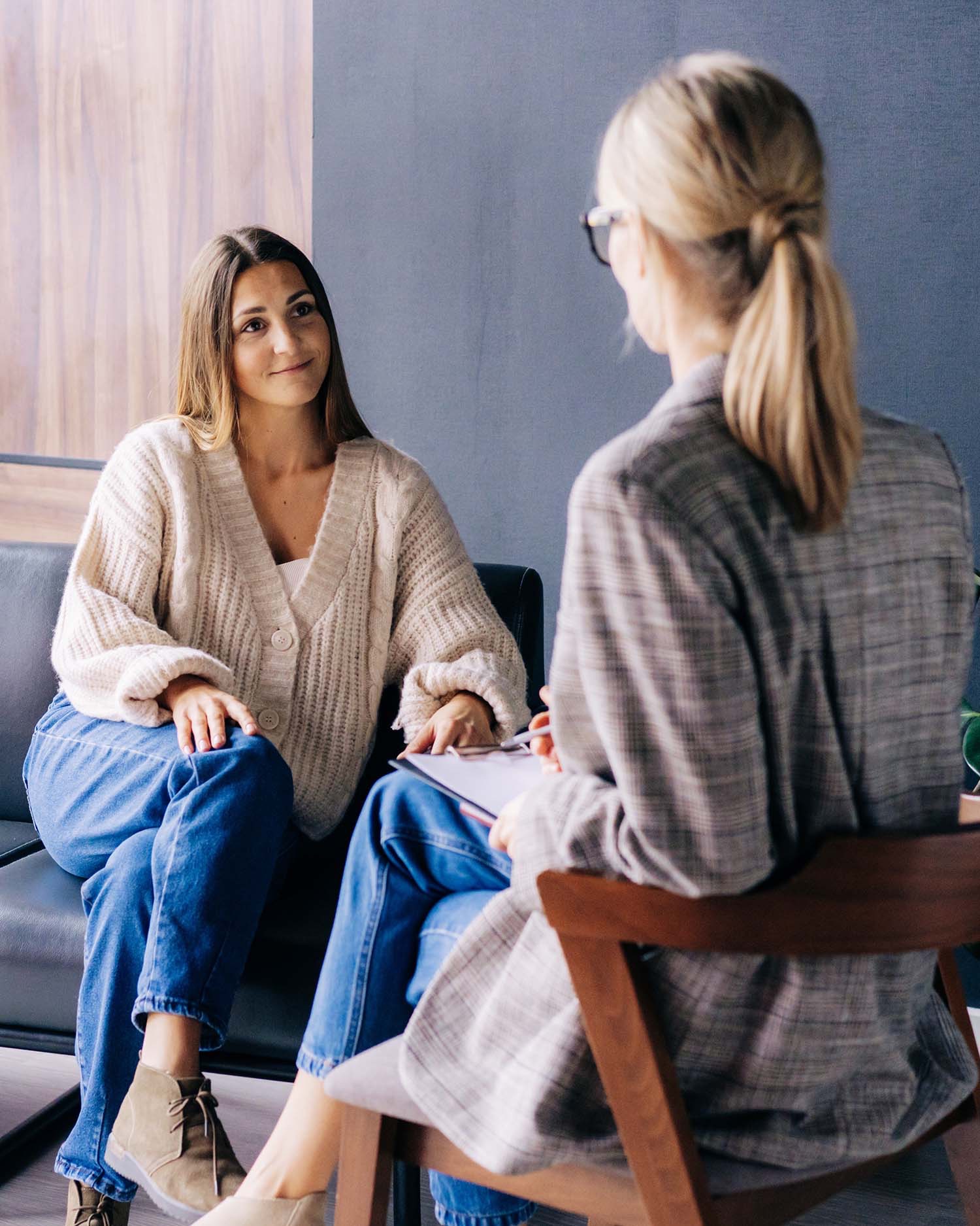 Woman having a conversation with a practitioner