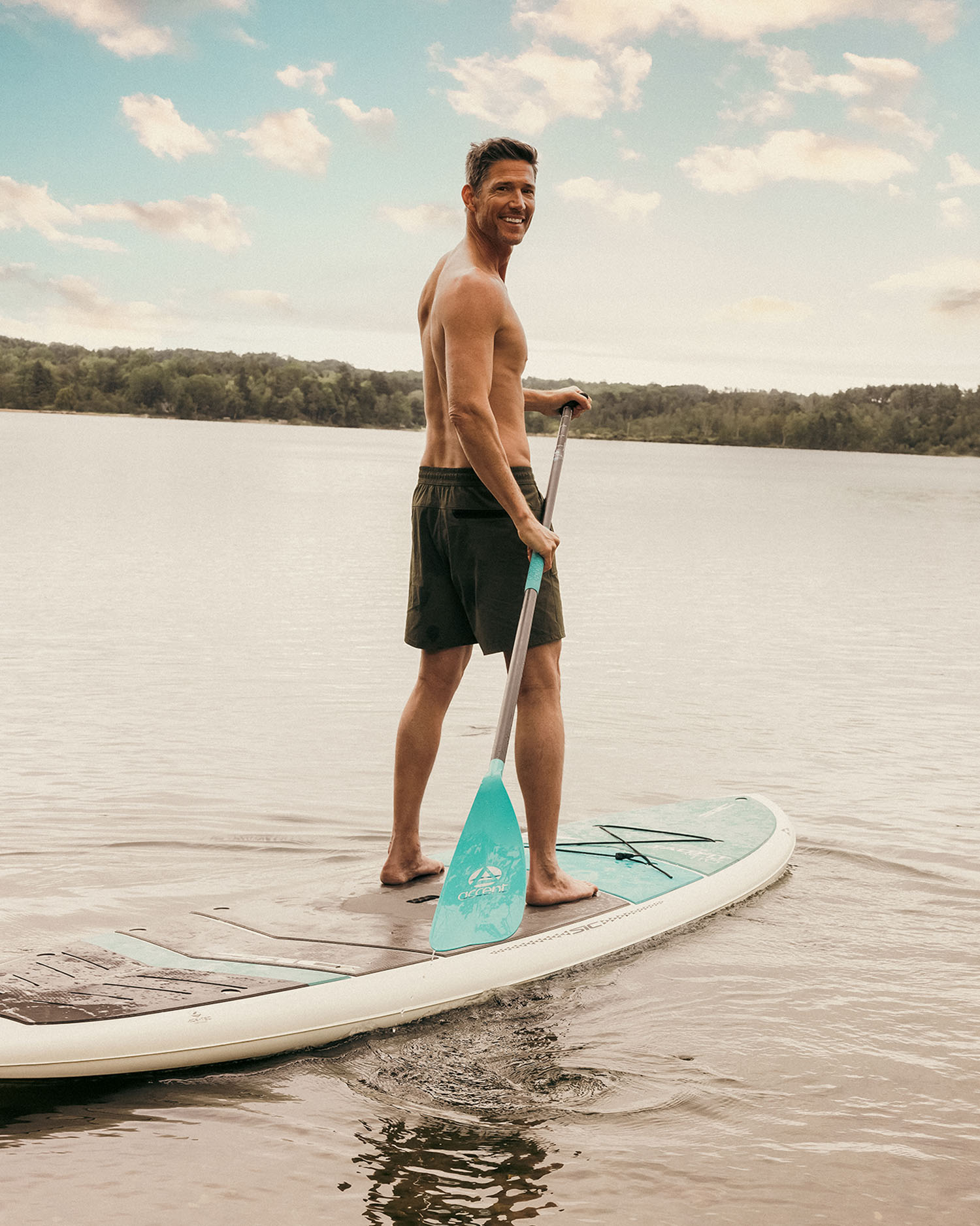 Man Paddleboarding at Canyon Ranch Lenox