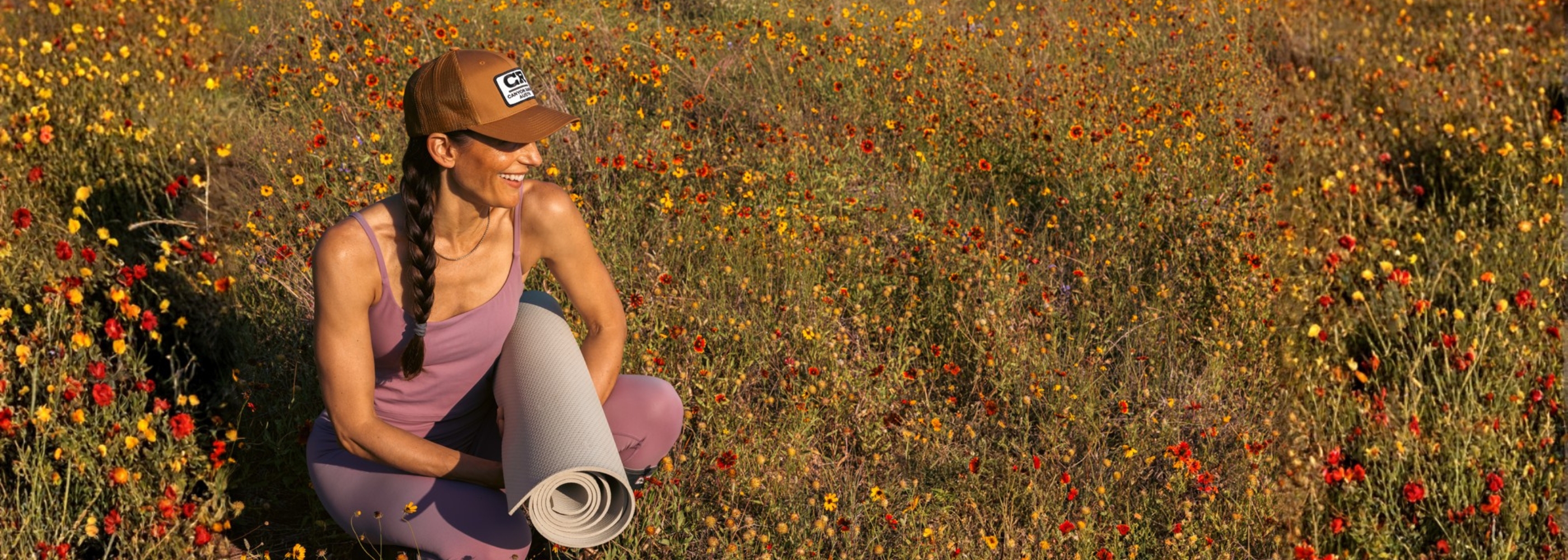 A woman in a field of wildflowers