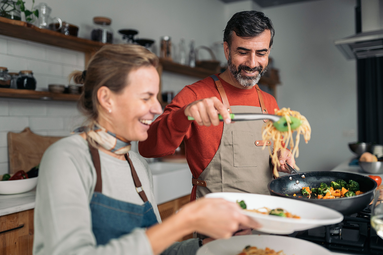 a couple cooking together
