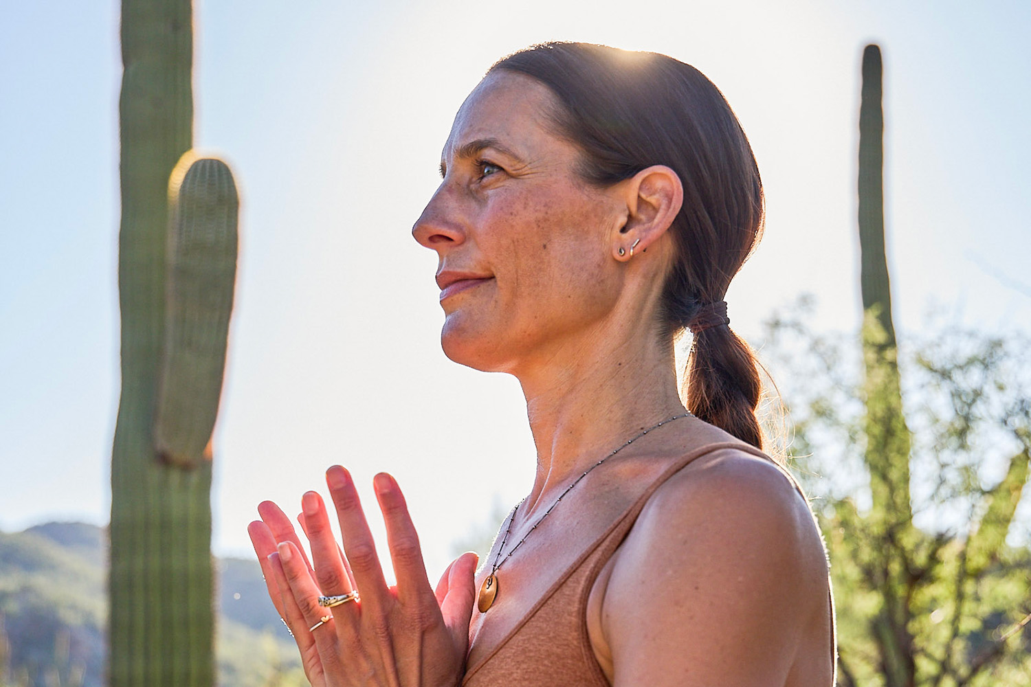 a woman doing yoga in the Sonoran Desert