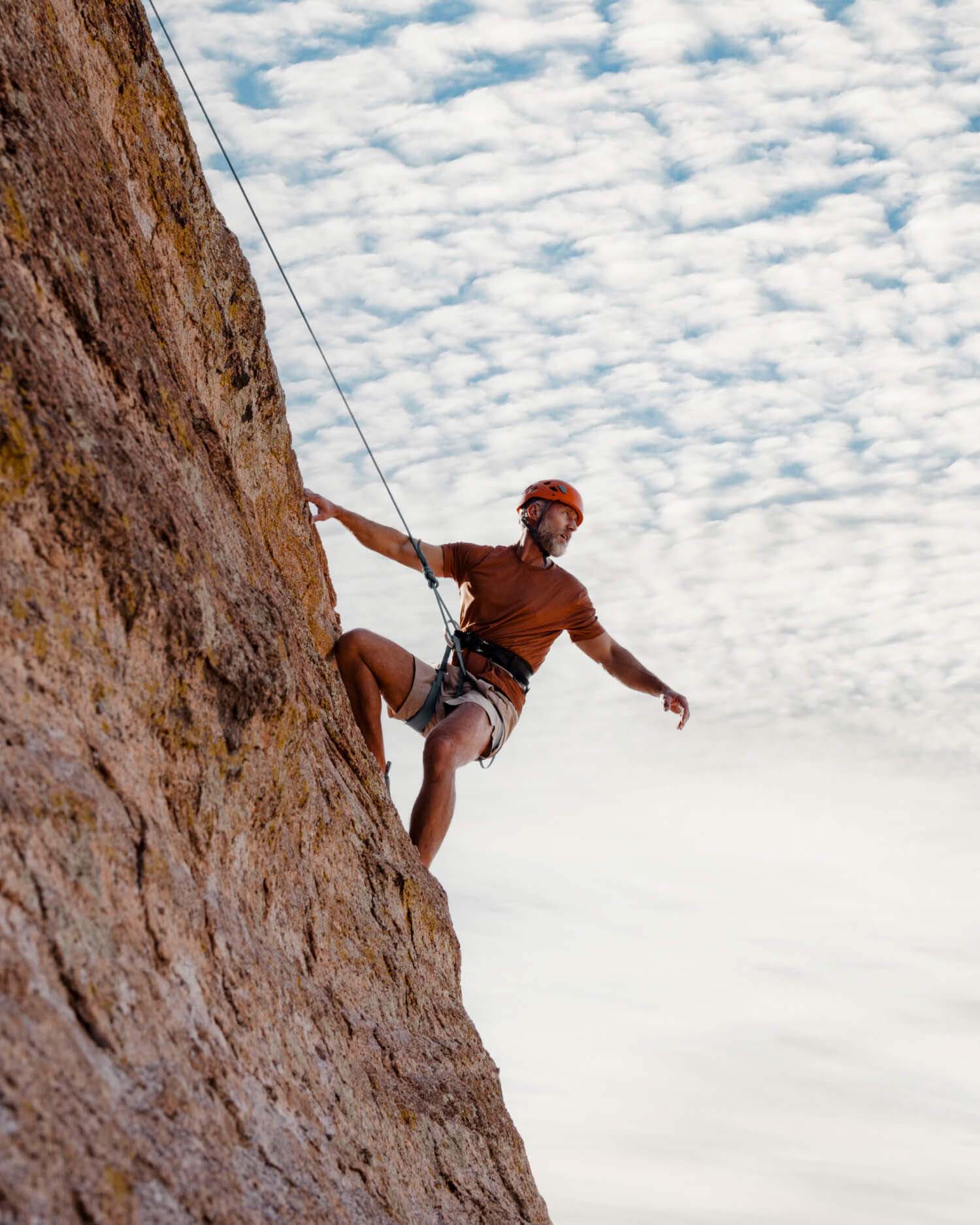 a man rock climbing