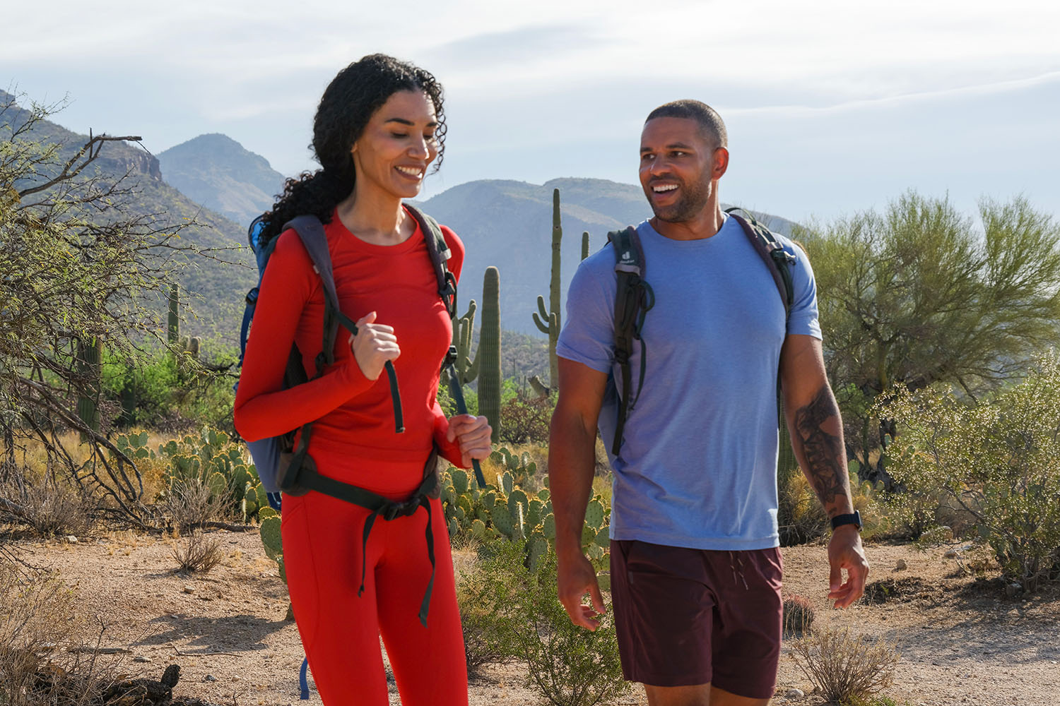 a couple hiking in the Sonoran Desert