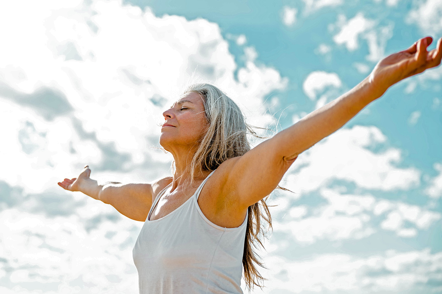 a woman stretching outside