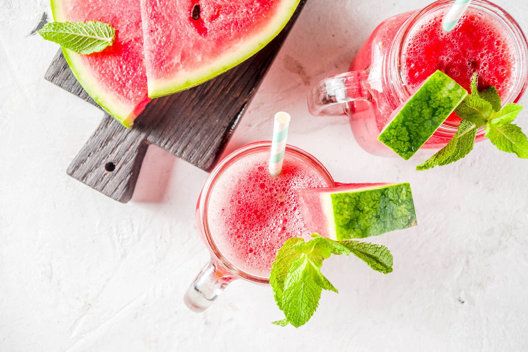 a smoothie surrounded by watermelon