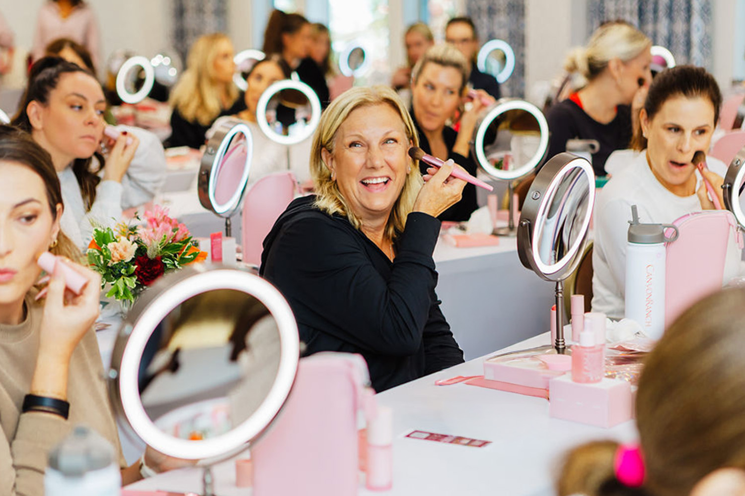 Woman During a Beauty Product Class at Enchant 