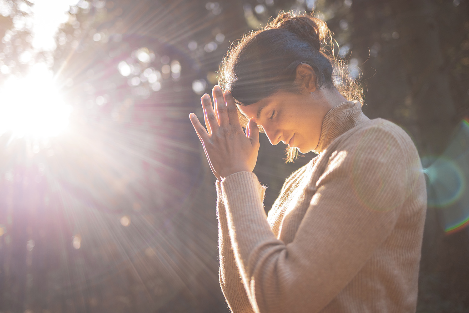 Woman Meditating in the Forrest 