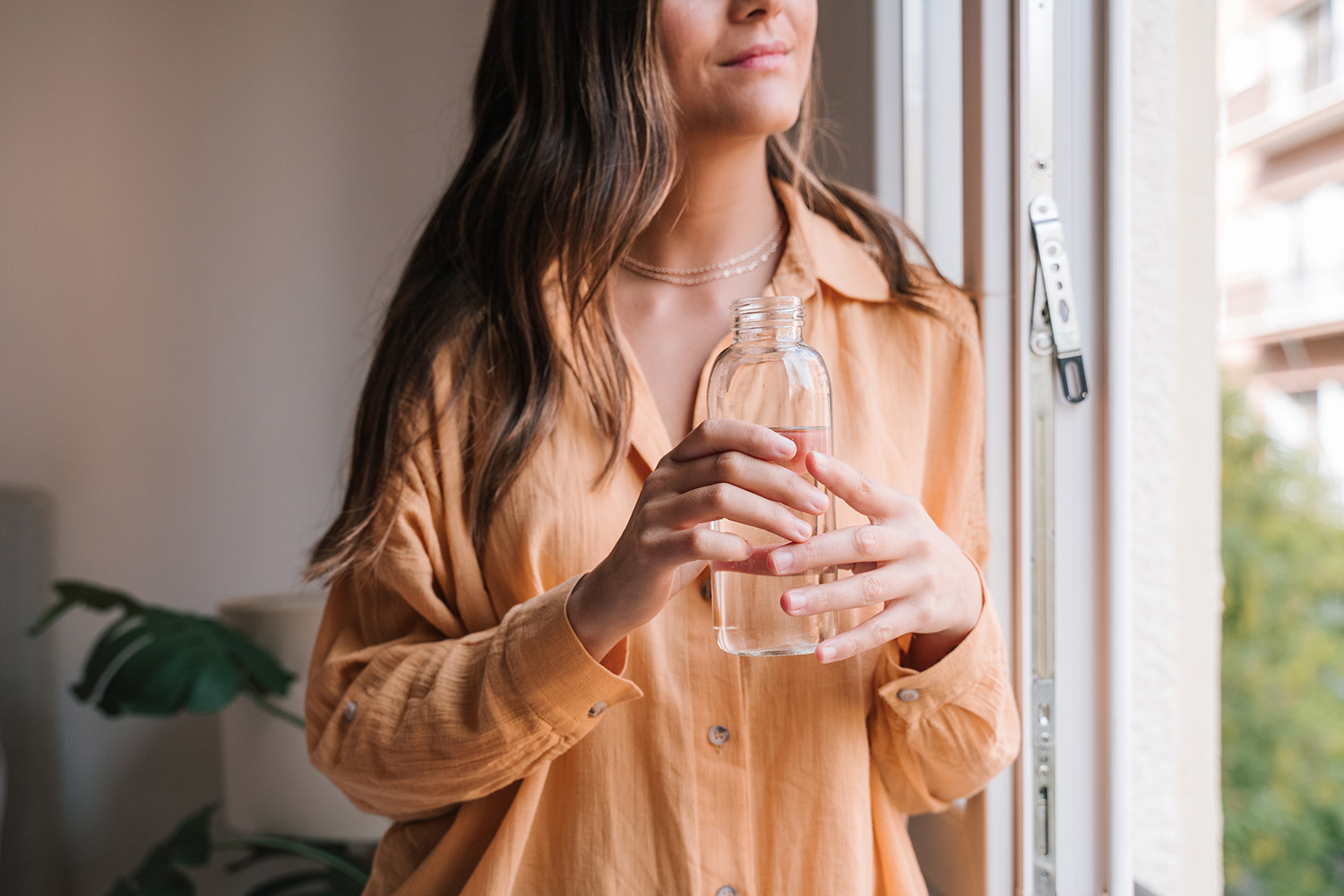 Woman With A Big Bottle Of Water In Her Hands 