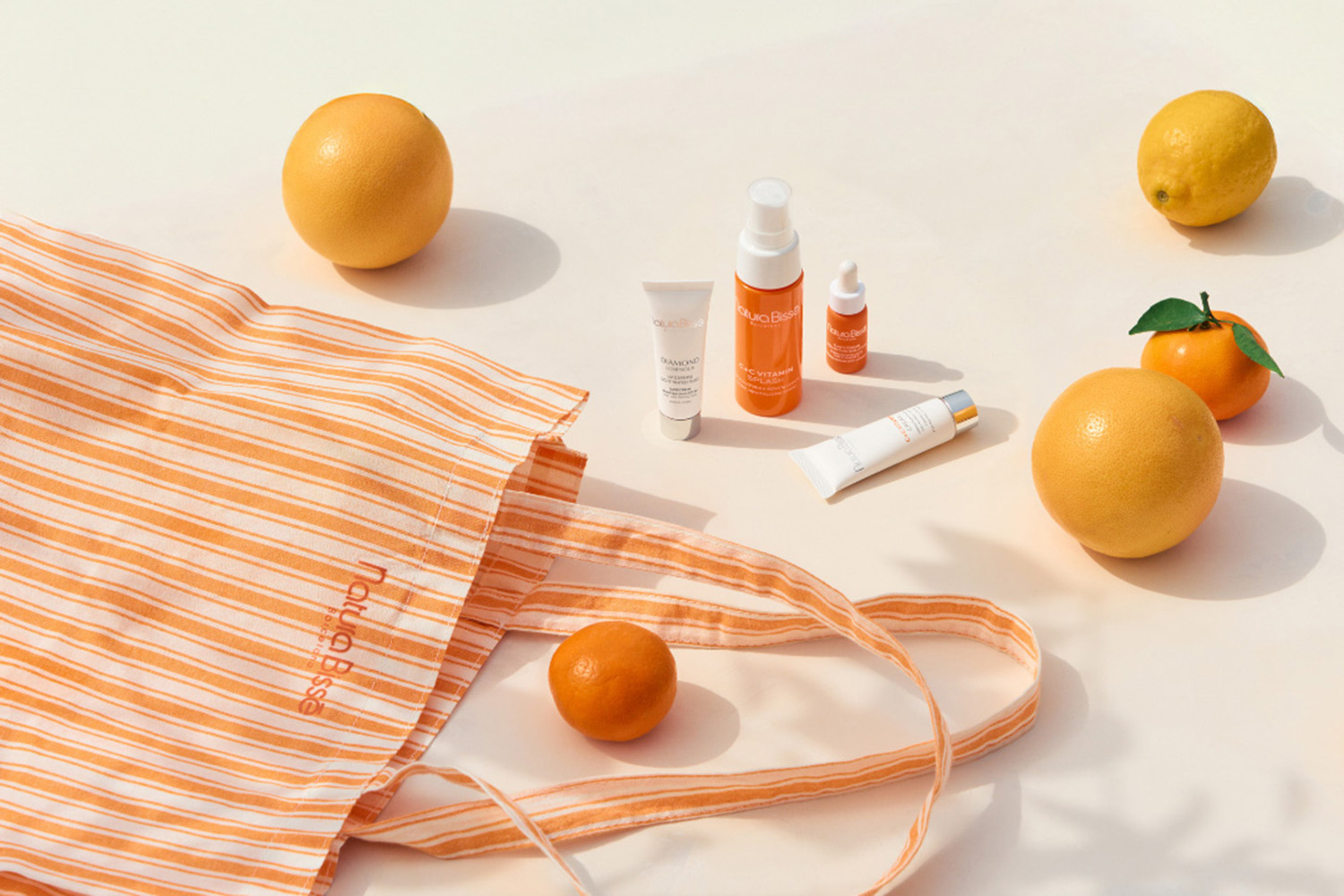 a display of orange products with orange fruits
