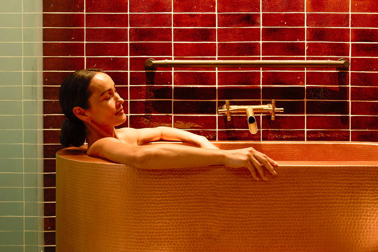 Woman Relaxing in a Tub 