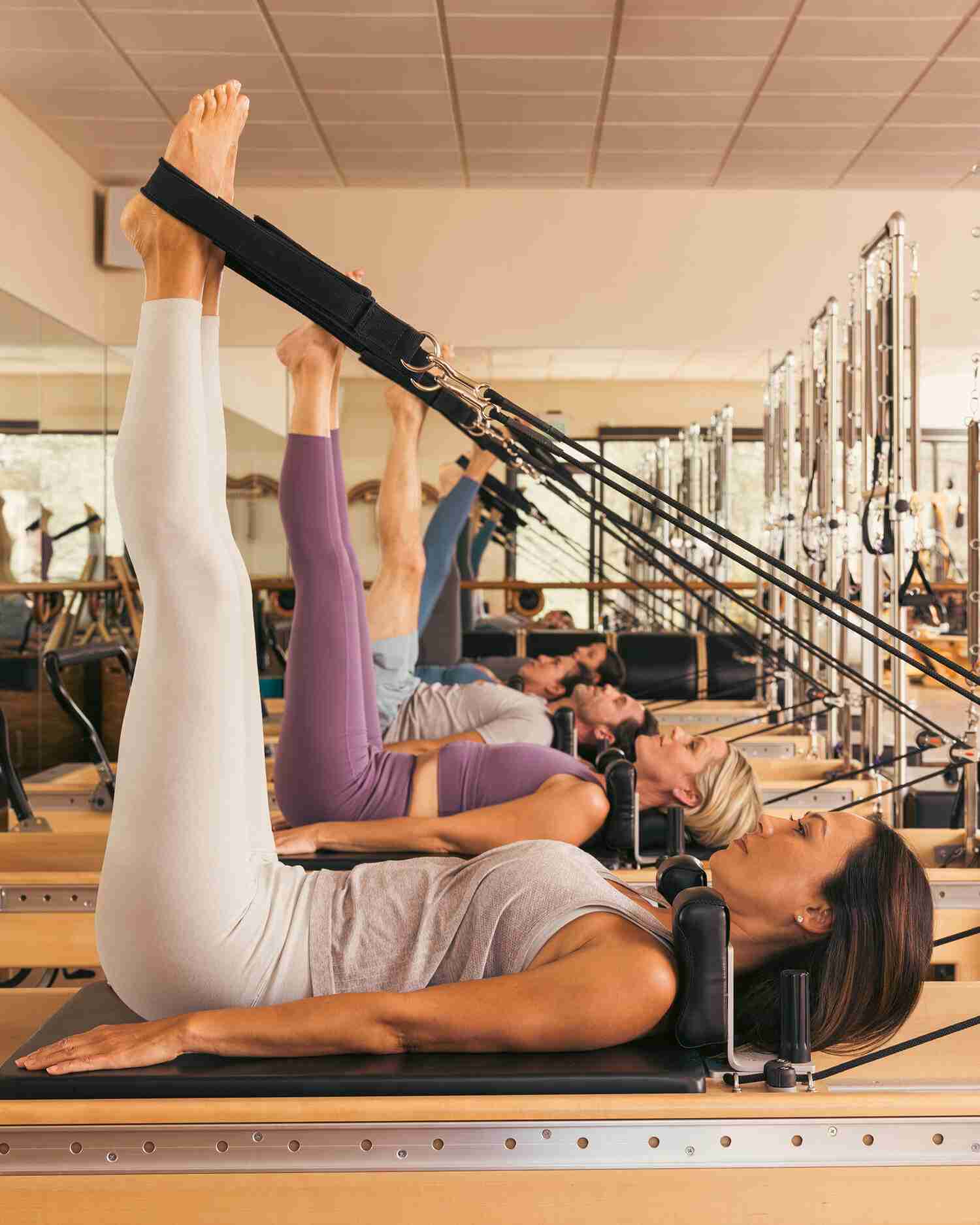 A Group of Women Doing Performer Pilates