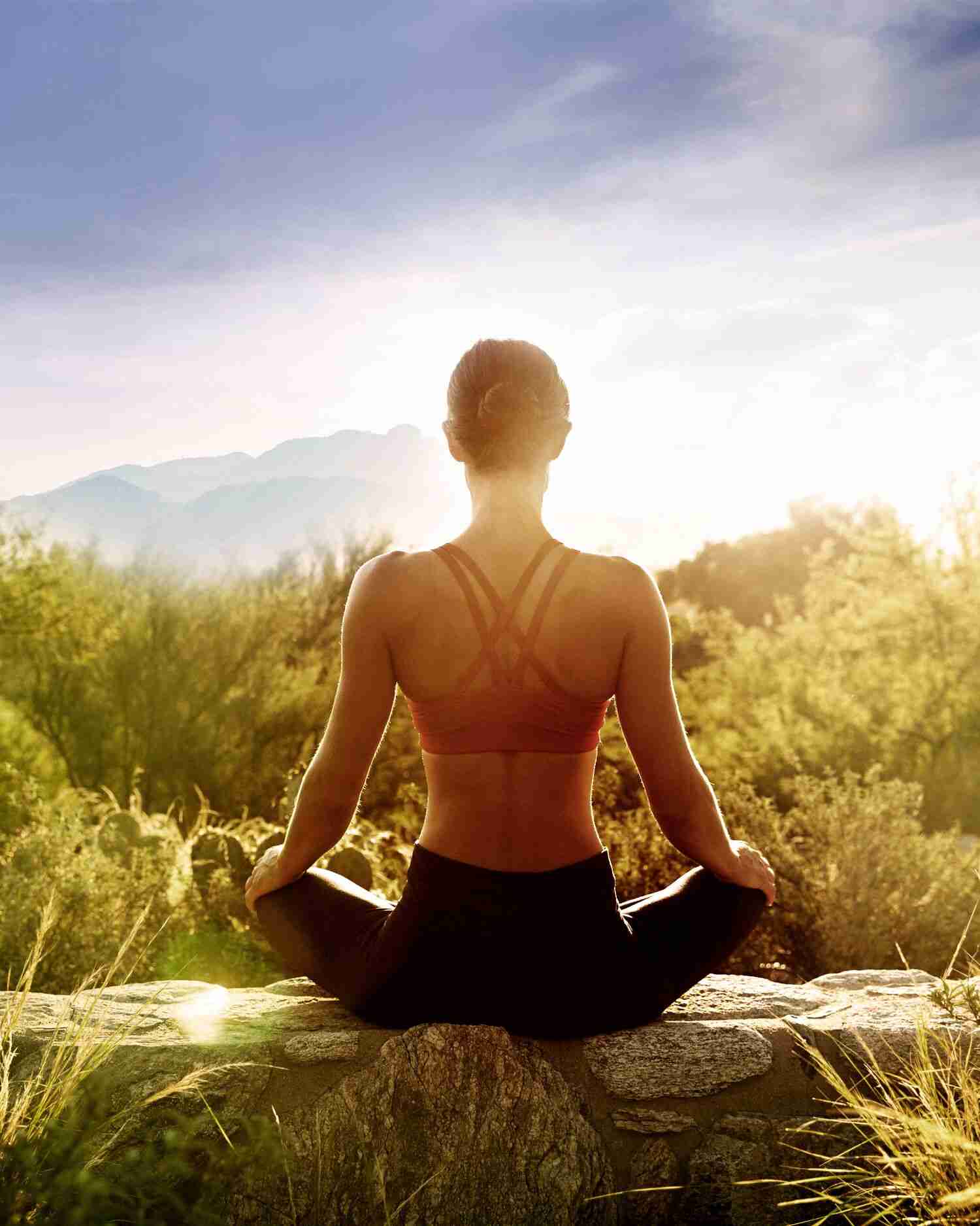A woman getting an outdoor meditating