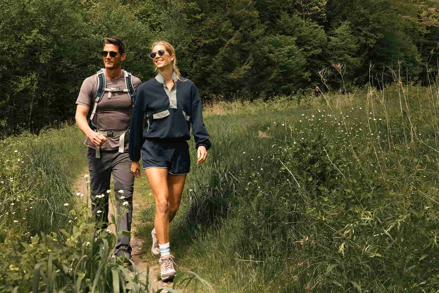 Woman and Man Walking in the Outdoors