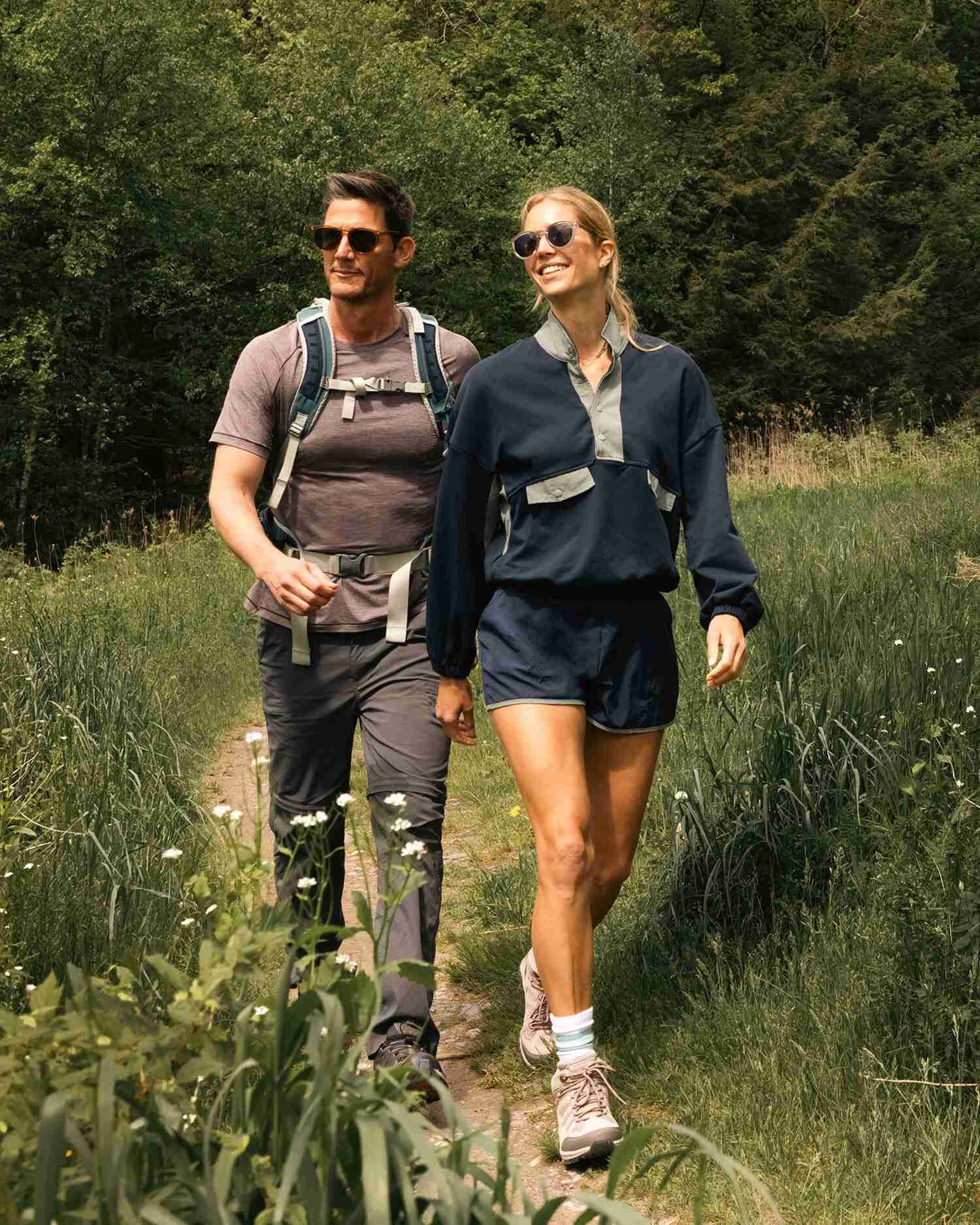 Woman and Man Walking in the Outdoors